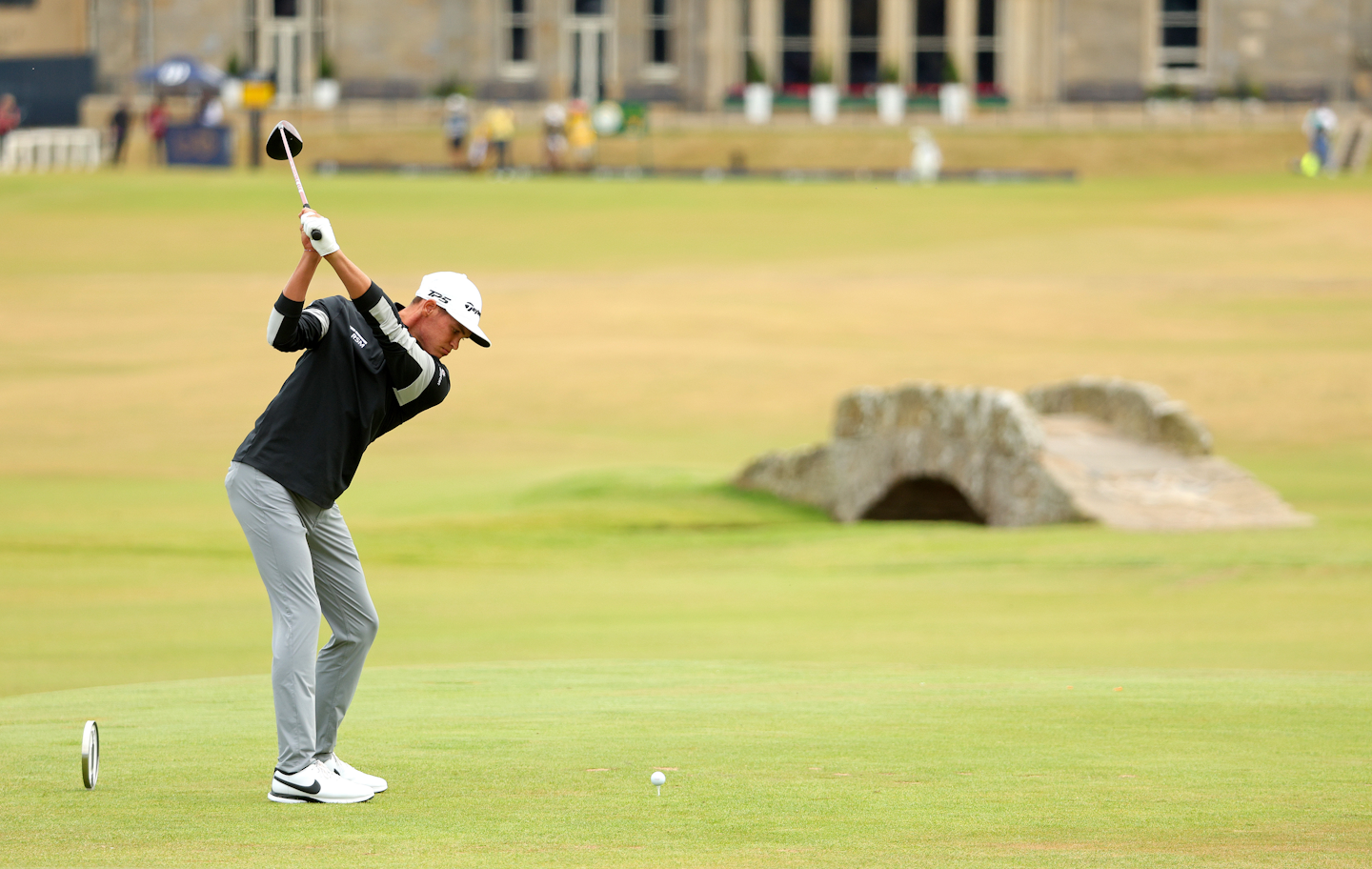 Aaron Jarvis hits over the famous Swilcan Bridge at the 18th at St Andrews.