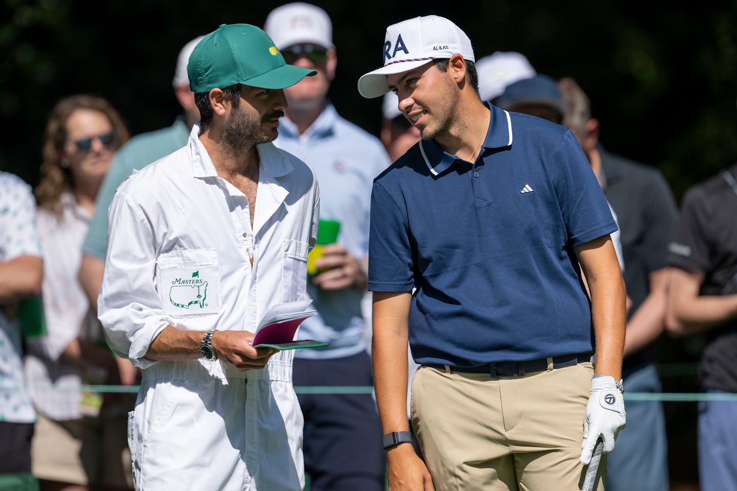 Santiago de la Fuente of Mexico speaks with his caddie on the No. 7 tee during practice round 1 prior to the start of the 2024 Masters Tournament